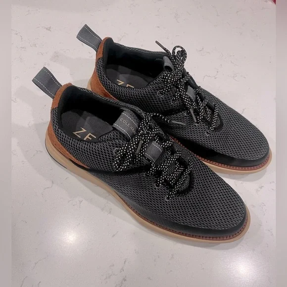 Cole Haan Men's Grand Atlantic Sneaker
Color: Black/Magenet/British Tan Size 8 - Picture 2 of 7